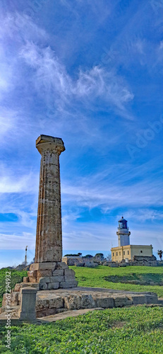 Lighthouse and Roman column at Capo Colonna, Crotone, Italy