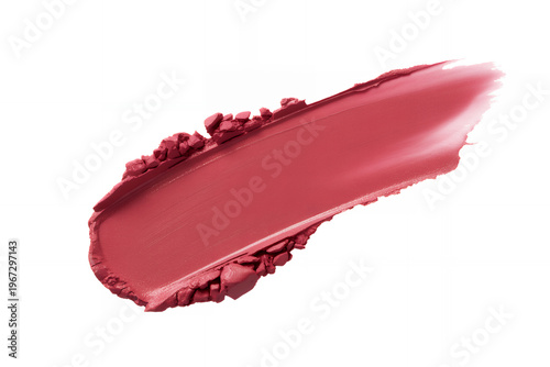 Smear of reddish brown lipstick on white background