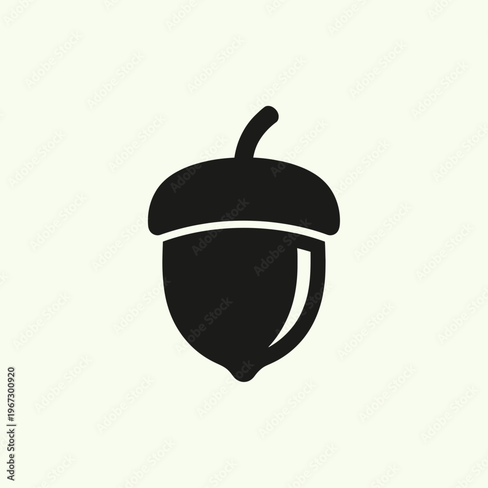 Fototapeta premium Simple black acorn icon representing nature and its elements in a minimalist style.
