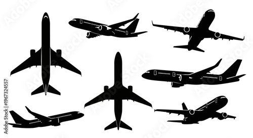 Collection of various airplane silhouettes in different flight positions.