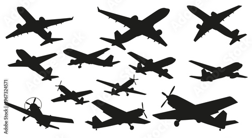 Collection of various airplane silhouettes in different flight positions.