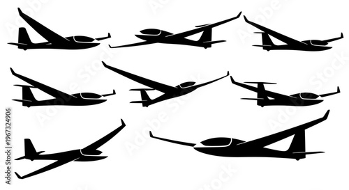 Collection of various glider aircraft silhouettes in different flight positions.