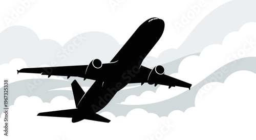 Silhouette of a large passenger airplane flying through the clouds.