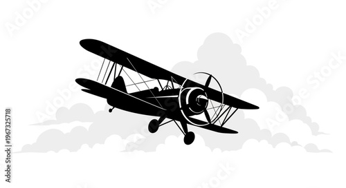 Vintage Biplane Silhouette Flying Through Clouds.