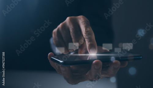 Hand Holding Smartphone with Glowing Screen and Floating Chat Bubbles in Dark