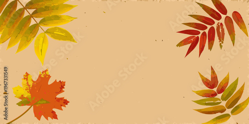 Autumn leaves arranged around a neutral beige background