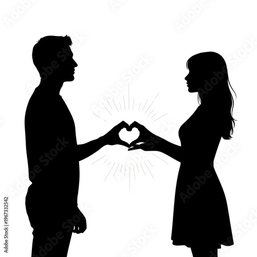 A loving couple forms a heart shape with their hands in a romantic gesture