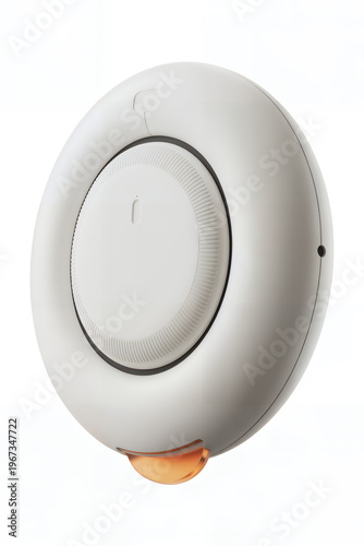 White wireless speaker with black rim and orange stand white speaker audio