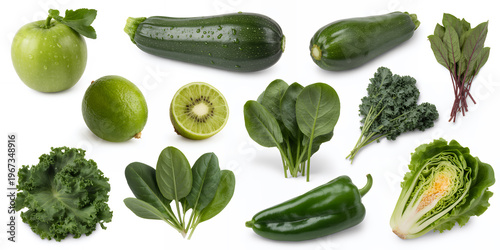 Assorted green fruits and vegetables on white background apple zucchini
