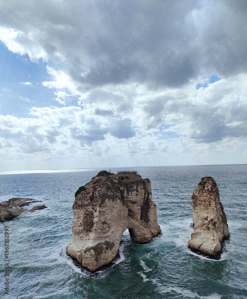 Fototapeta premium Scenic view of the Raouche Rocks (Pigeon's Rock) in the Mediterranean Sea, Beirut, Lebanon.