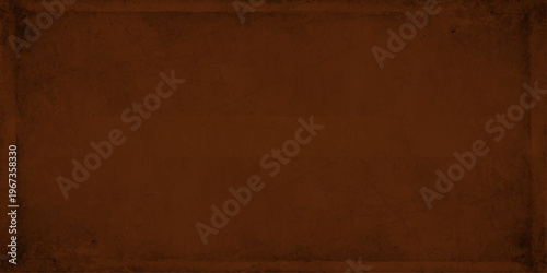 Dark brown vintage grunge background texture with subtle border frame and antique weathered paper effect for design