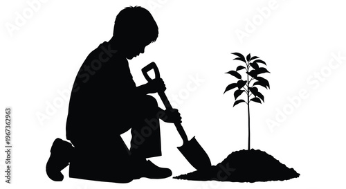 A young boy plants a small tree with a shovel silhouette