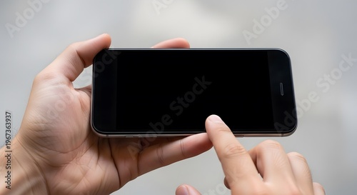 Close-up of Person Using Smartphone with Touchscreen.