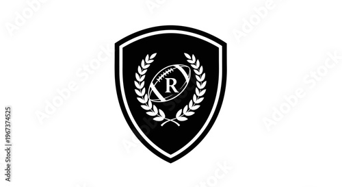 Classic black shield emblem with a football, laurel wreath, and initial 'R', isolated white background.