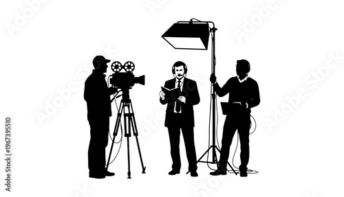 A film crew silhouette working on a movie set with camera and lighting