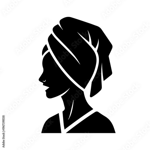 Woman with a towel on her head, representing spa and wellness treatments