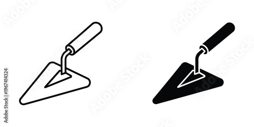 Comparison of a trowel with a standard handle versus an ergonomic black handle