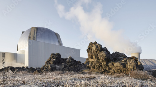 Dissipating steam rises from a hi-tech nuclear reactor dome in a frosted northern volcanic landscape