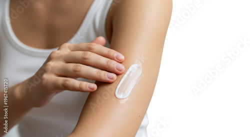 Woman applying white cream to her arm for skin care and moisturizing routine on isolated transparent background