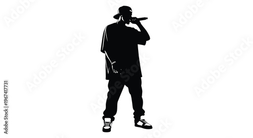 A rapper performing with a microphone captured in a striking silhouette