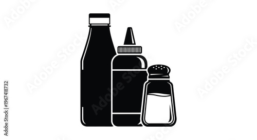 Black condiment bottles and shaker in a stark graphic silhouette