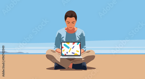 A person sitting cross-legged on a beach, focused on a laptop with a colorful abstract screen, enjoying a relaxed outdoor work or leisure moment.