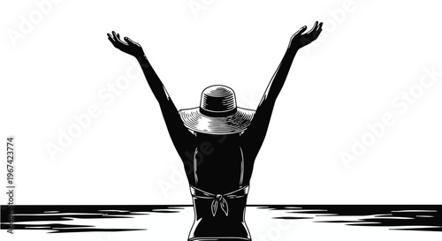 Silhouette of a woman in a sun hat with arms raised standing in the ocean