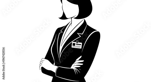 Businesswoman standing confidently in suit with ID badge  