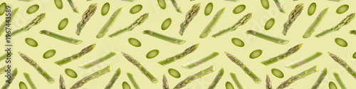 Seamless pattern with fresh green asparagus on colored background. Vegetable texture for packaging.