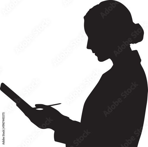 Silhouette of a woman writing on a tablet with a stylus