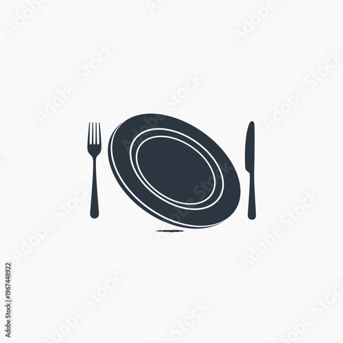 Elegant dining arrangement featuring a plate fork and knife ready for a meal.