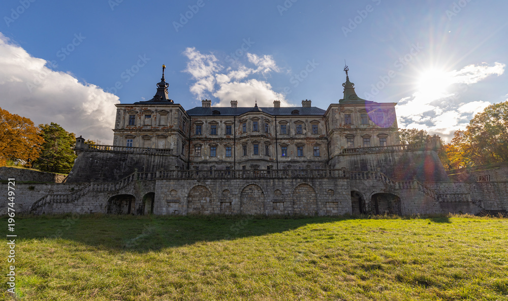 Fototapeta premium Renaissance Pidhirtsi Castle with dramatic storm clouds in Ukraine