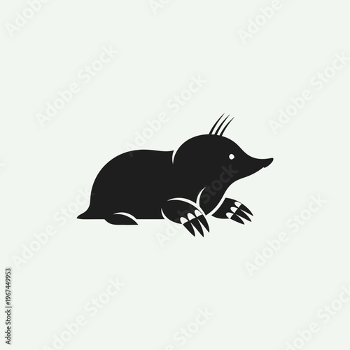 Silhouette of a mole a small subterranean mammal in a simple illustration.