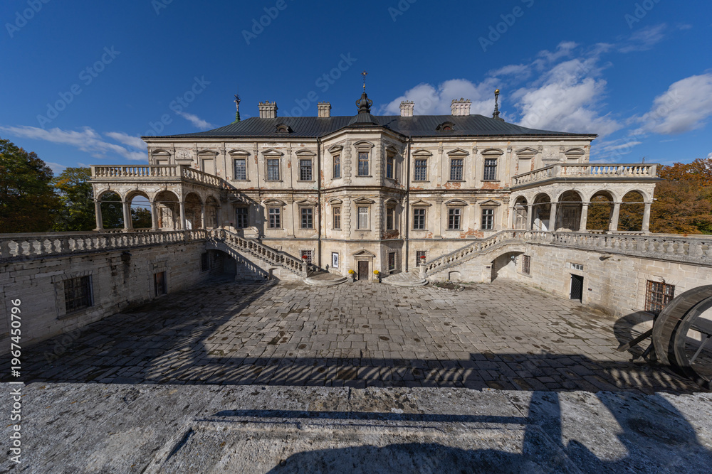 Fototapeta premium Renaissance Pidhirtsi Castle with dramatic storm clouds in Ukraine
