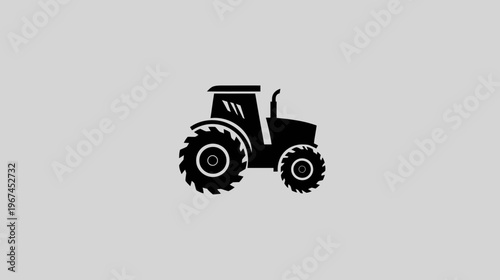 Silhouetted illustration of a tractor, rendered in black on a light gray background