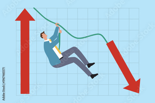 Businessman struggles to prevent a financial downturn on a graph