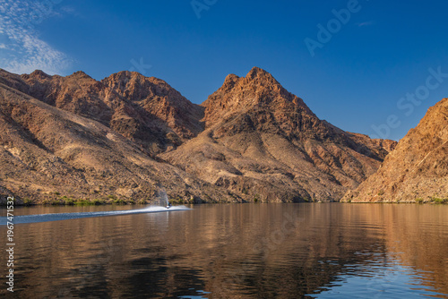 Mountainous landscape with boat on Lake Mead National Recreation Area, Arizona