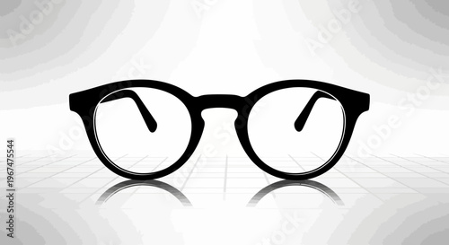 Stylish black frame eyeglasses with clear lenses on a reflective white surface.