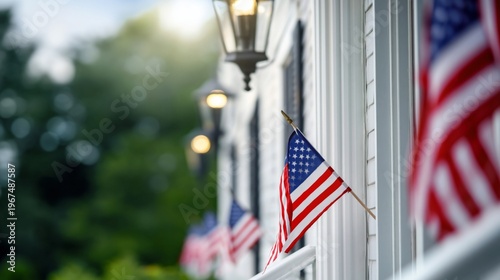 Flags Hang on a House Showcasing Patriotism During a Festive Time in the Comm...