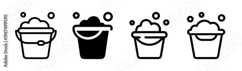 Set of four bucket with soapy water icons in outline and solid styles.