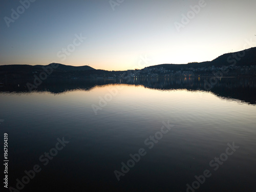 Panorama of Lake Orestiada around town of Kastoria, Greece