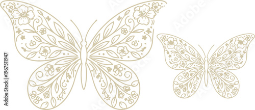 Elegant golden butterflies with detailed floral patterns adorning their wings, ideal for spring or summer design projects and decorative backgrounds.