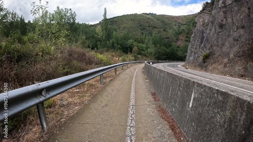 French Way of Saint James - pedestrian and cycle path along the N-6 road between Villafranca del Bierzo and Trabadelo, comarca of El Bierzo, province of Leon, Spain
