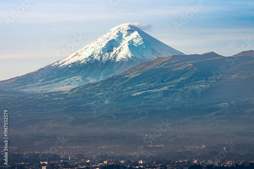 Snow-capped Cotopaxi volcano rising above Andean landscape near Quito Ecuador