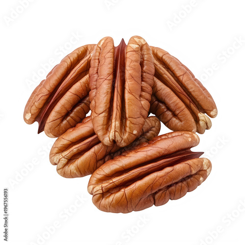 A small pile of raw, shelled pecan nuts isolated on a black background.