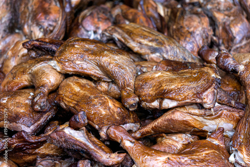 Fresh smoked chicken thighs are on display at the fair.