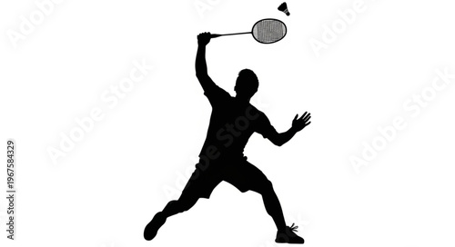 Silhouette of a Badminton Player Smashing Shuttlecock.