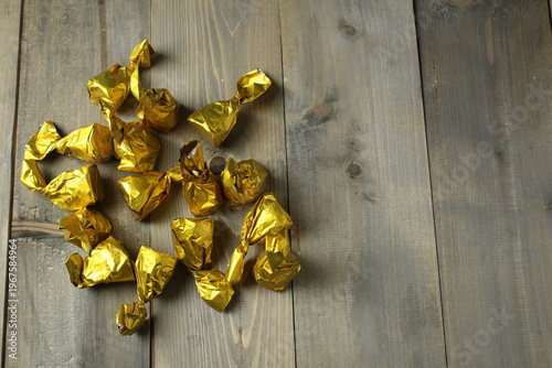 Chocolate candies shape truffle on a gray background with space for copyspace text