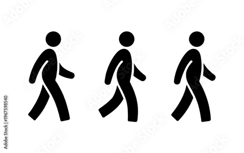 A trio of walking figures in silhouette.