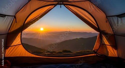 Serene mountain landscape viewed from inside orange tent at sunrise sunset